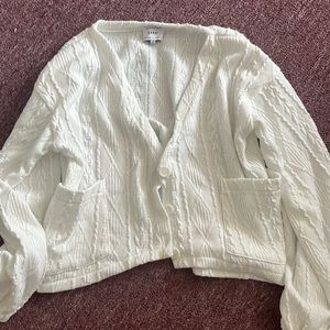 White crochet pattern sweater